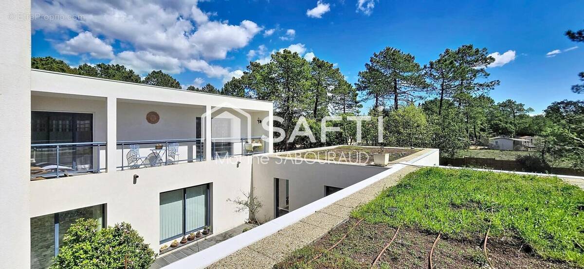 Photo 1 - Maison à REGUSSE