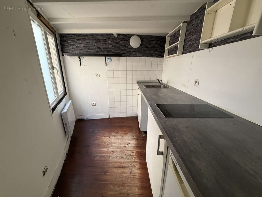Lot de 4 appartements + cave + 2 remises aménageables - photo 9