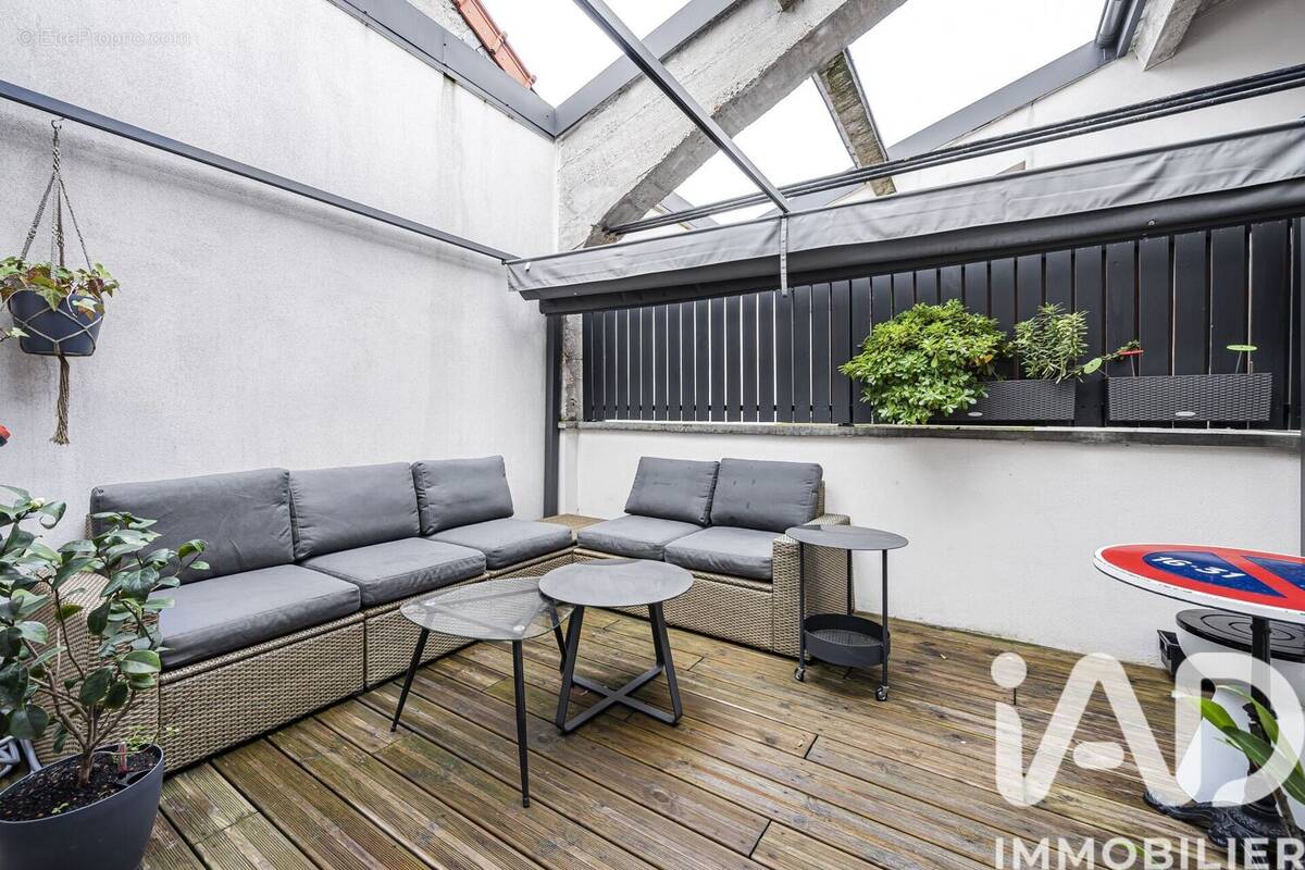 Photo 1 - Commerce à NANTERRE