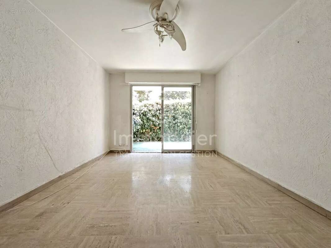 T3 traversant sud-nord 62m² rez-de-jardin - photo 5