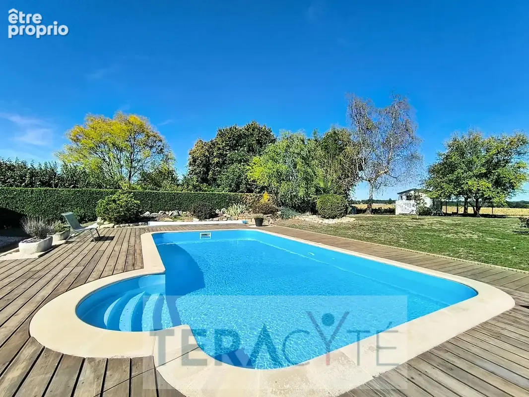 Maison 5 pièces 132 m² à vendre à Polliat (01310) - photo 2