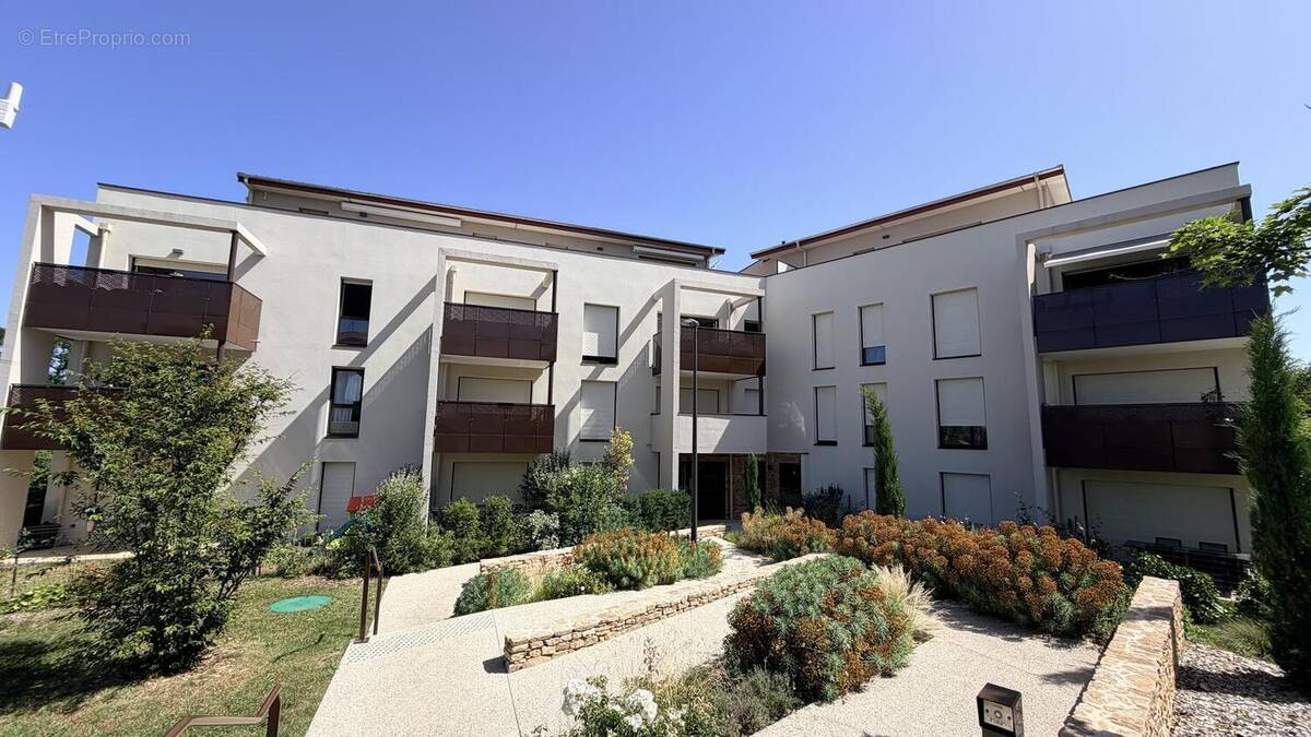 Photo 1 - Appartement à LA TOUR-DE-SALVAGNY