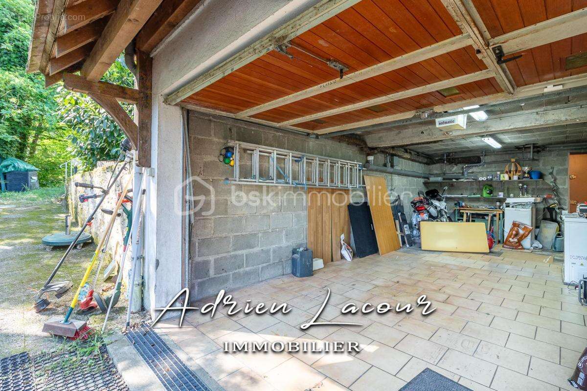 Jolie maison sur sous-sol avec son parc arboré - photo 11
