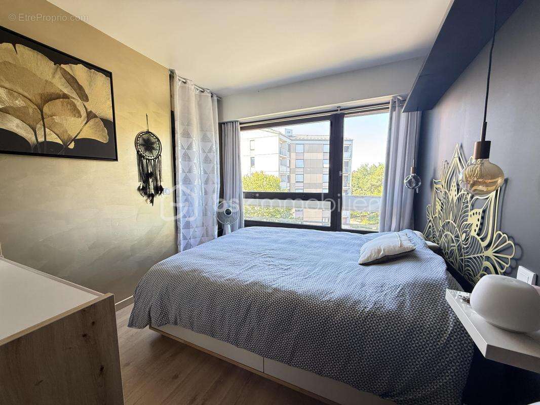 Appartement 4 pièces avec balcon, cave et parking sécurisé - Seynod - photo 8