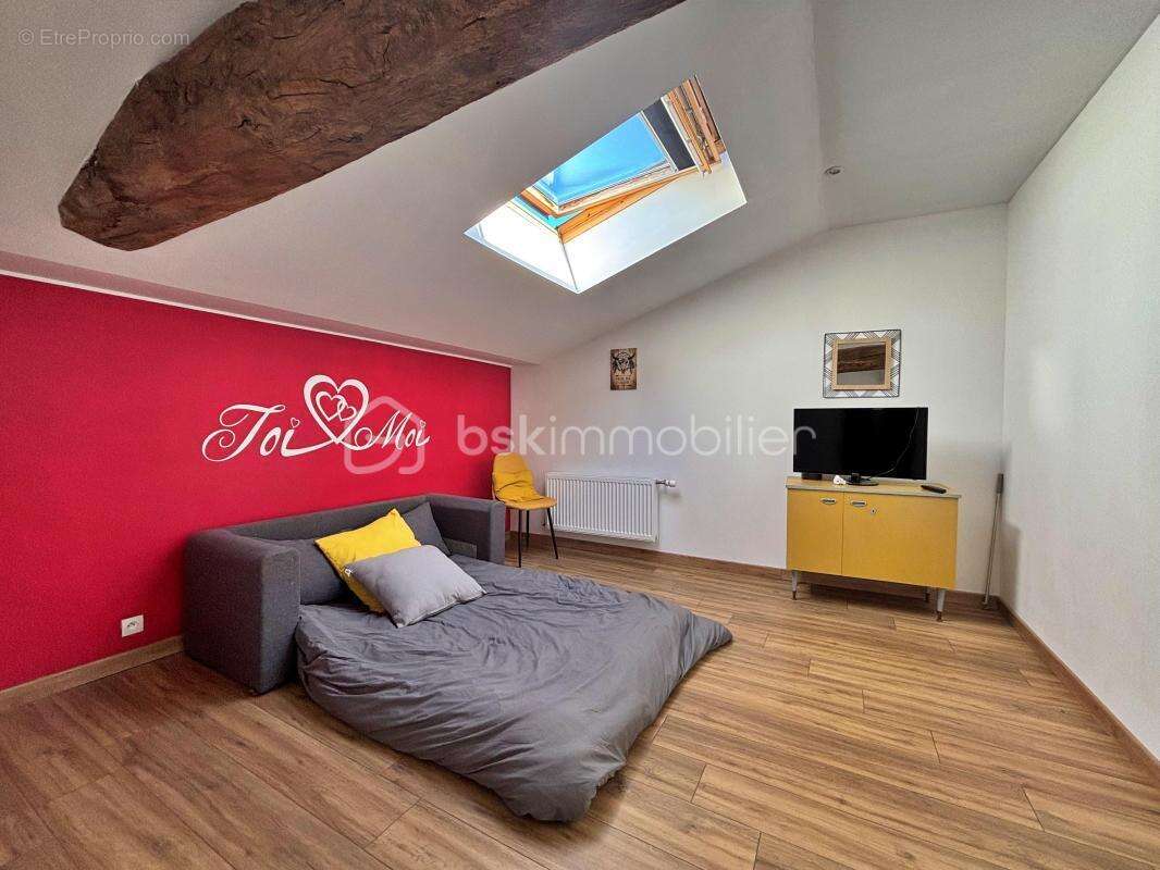 Découvrez le charme d'une maison spacieuse - photo 11