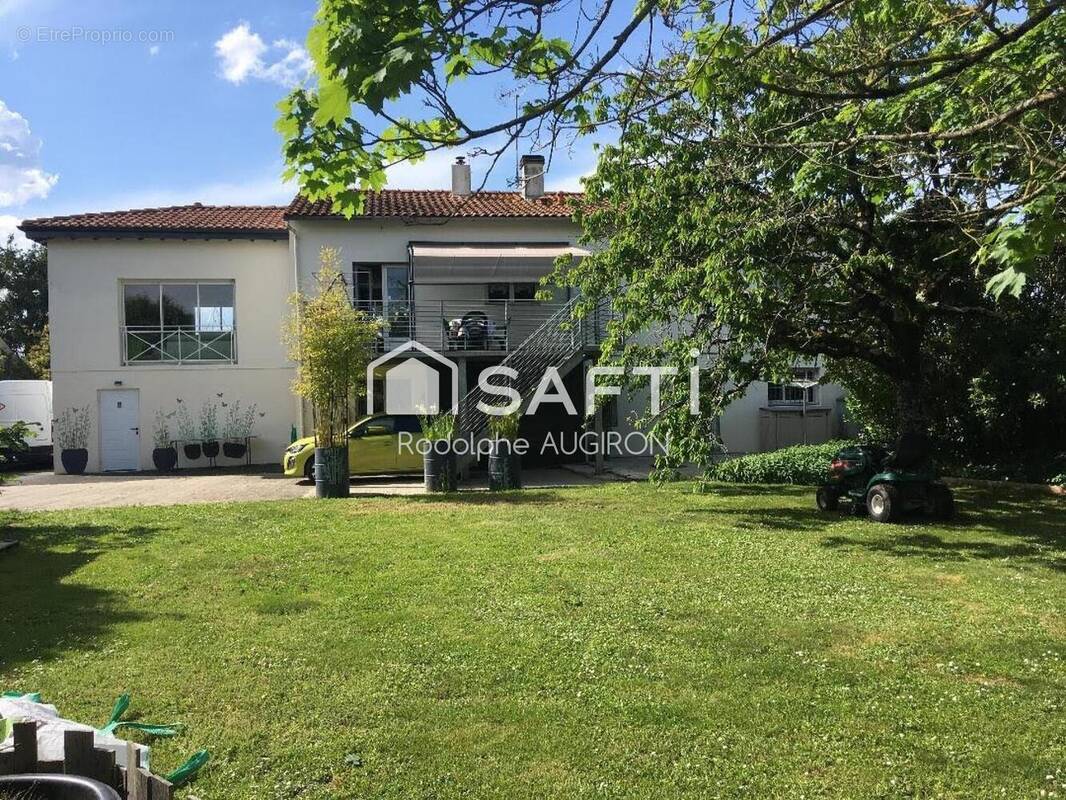 Photo 1 - Maison à SAINT-PIERRE-D'AMILLY