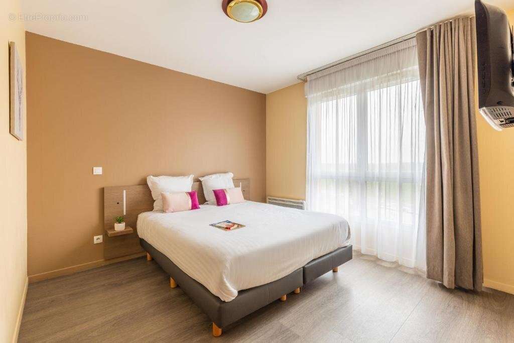 Appartement à MAGNY-LES-HAMEAUX