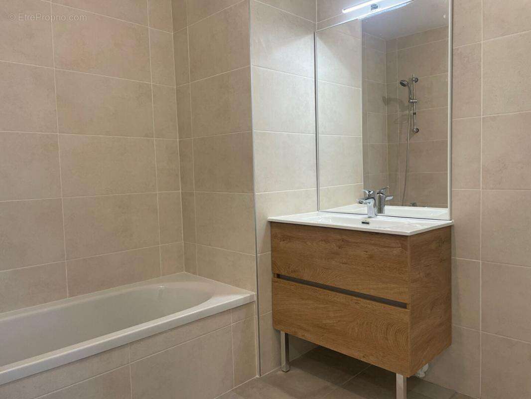 VAUGNERAY Appartement T4  1er étage - Terrasse 22 m² - photo 3