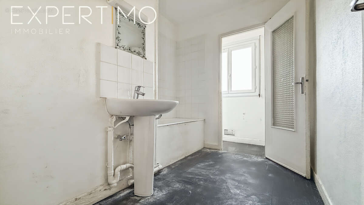 Appartement F3 lumineux à proximité du centre-ville d'Étampes - photo 6