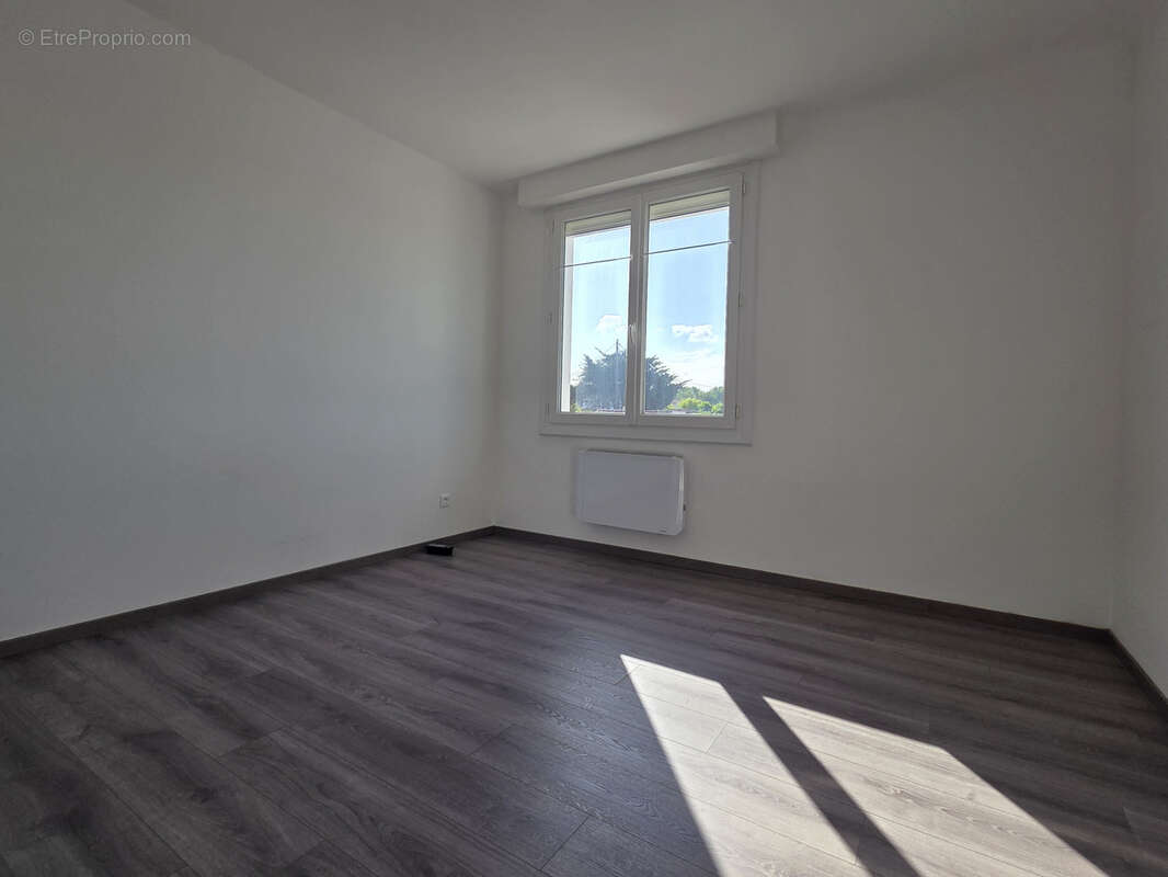 Ensemble immobilier d'habitations et de commerces - photo 4