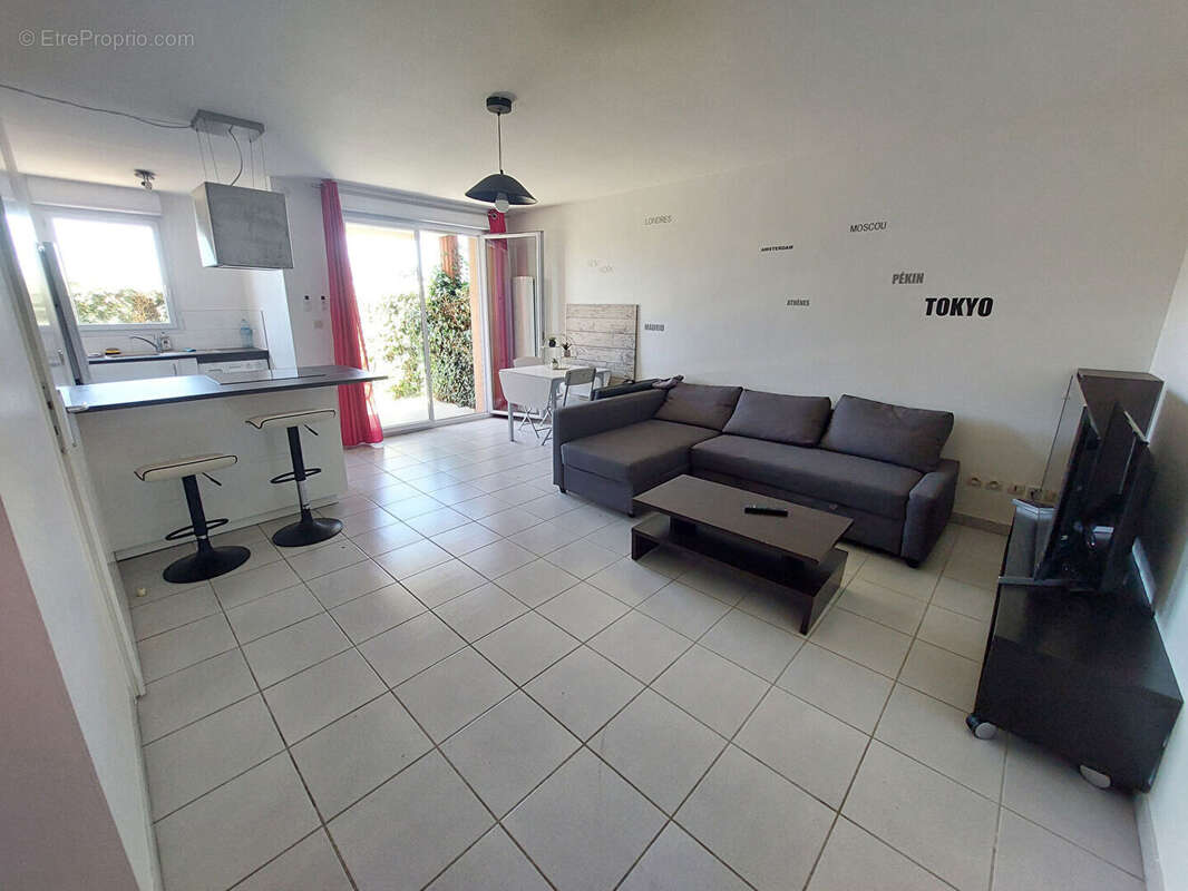 Seilh  LES ALLEES DU GOLF  Appartement T2 - Terrasse, jardin et parking - photo 3