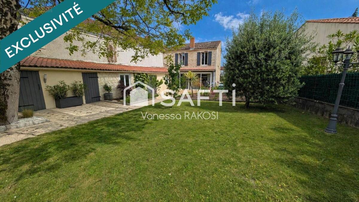 Photo 1 - Maison à SAINTES
