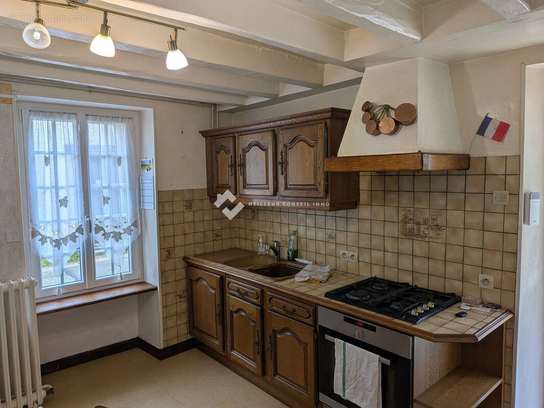 Maison 4 pièces 83 m² à vendre à Bazainville (78550) - photo 8