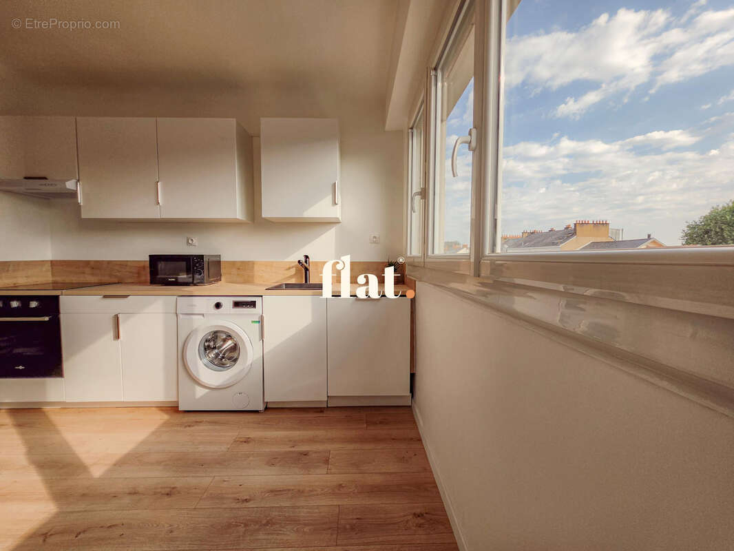 Appartement T3 de 70 m2  - RD POINT DE VANNES - 2 chambres + Cave - photo 2