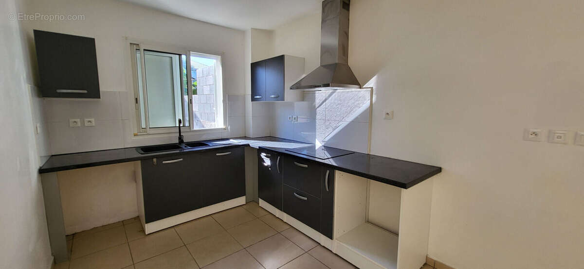 Photo 4 - Appartement à SAINTE-SUZANNE