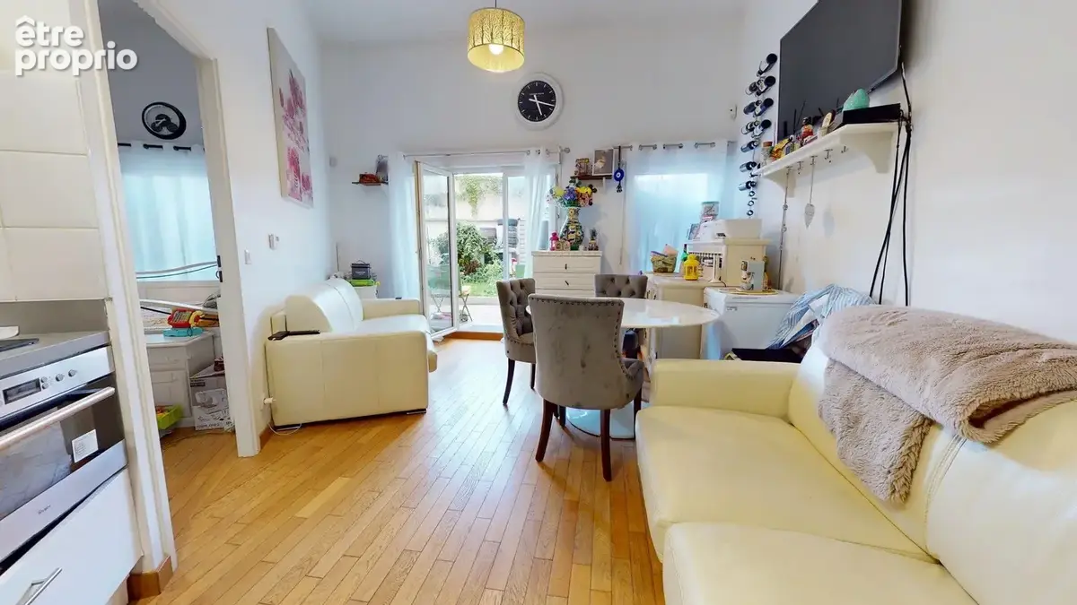 DRANCY_Appartement F2 avec terrasse et jardin privatif, parking. - photo 4