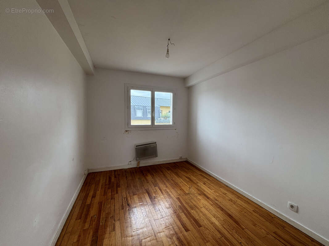 Appartement T3 à rénover - Place au bois - photo 7