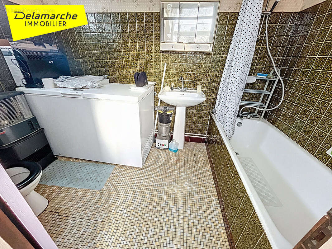 Maison à SAINT-AUBIN-DE-TERREGATTE