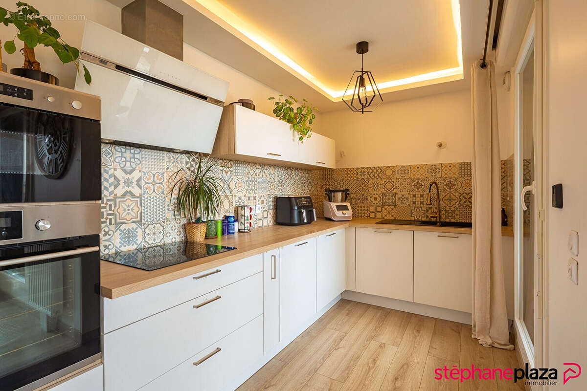 Appartement Colombes 4 pièce(s) 90 m2 - photo 6