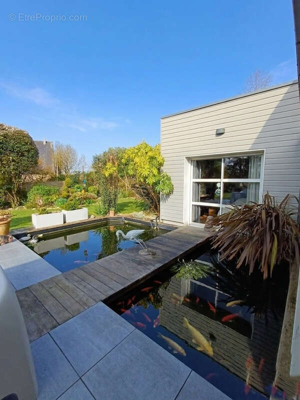Maison d'architecte de 240 m2 avec piscine sur terrain de 1700 m2 a saint gregoire - photo 11