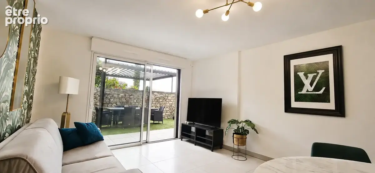 EXCLUSIVITE - Grand 2 pièces en rez de jardin + garage - photo 2