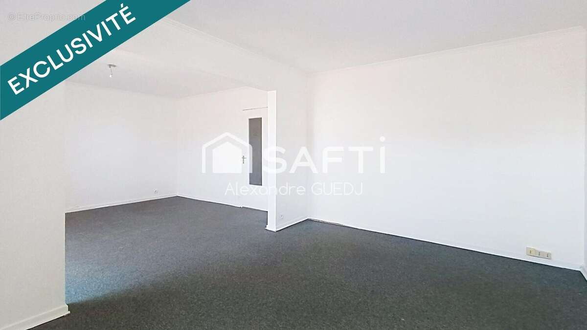 Photo 2 - Appartement à RILLIEUX-LA-PAPE