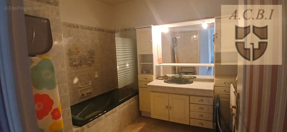 A VENDRE - Appartement - photo 8
