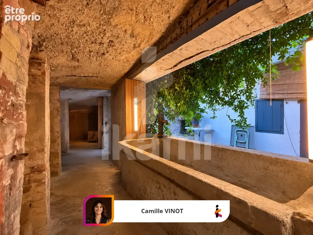 Appartement au cœur de Montmeyran avec balcon, cour, garage, caves, et surfaces supplémentaires - photo 3
