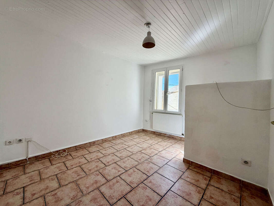 Maison à LAUDUN-L'ARDOISE