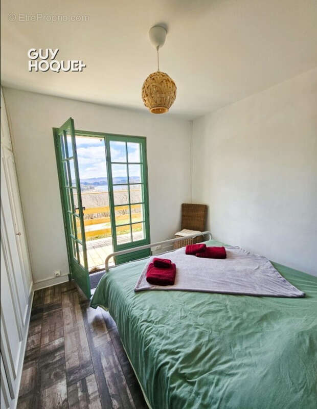 Maison de plain-pied avec piscine, jacuzzi et vue exceptionnelle sur le Lac des Settons - photo 12