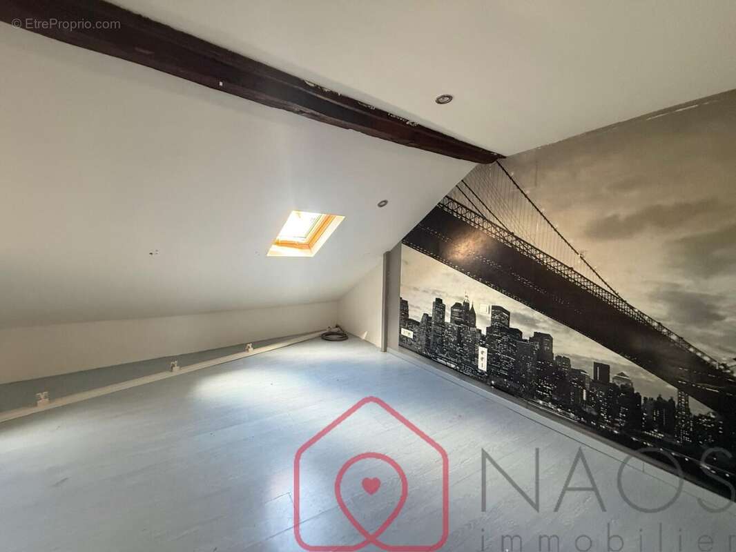 Appartement T2 de 66 m²  Dernier étage  Centre-ville de Sedan - photo 8