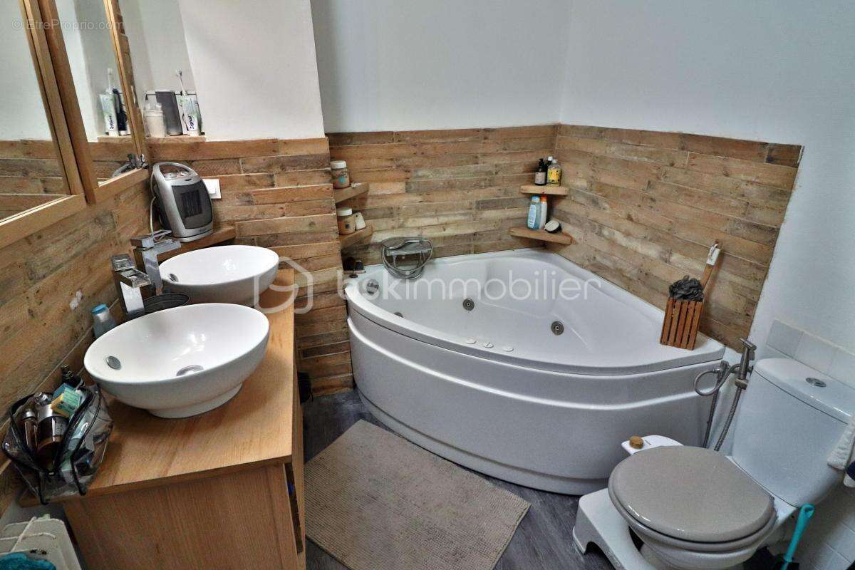 Maison de caractère de 185 m² – Terrasse de 22 m², pierres apparentes, loft et prestations de confort - photo 13