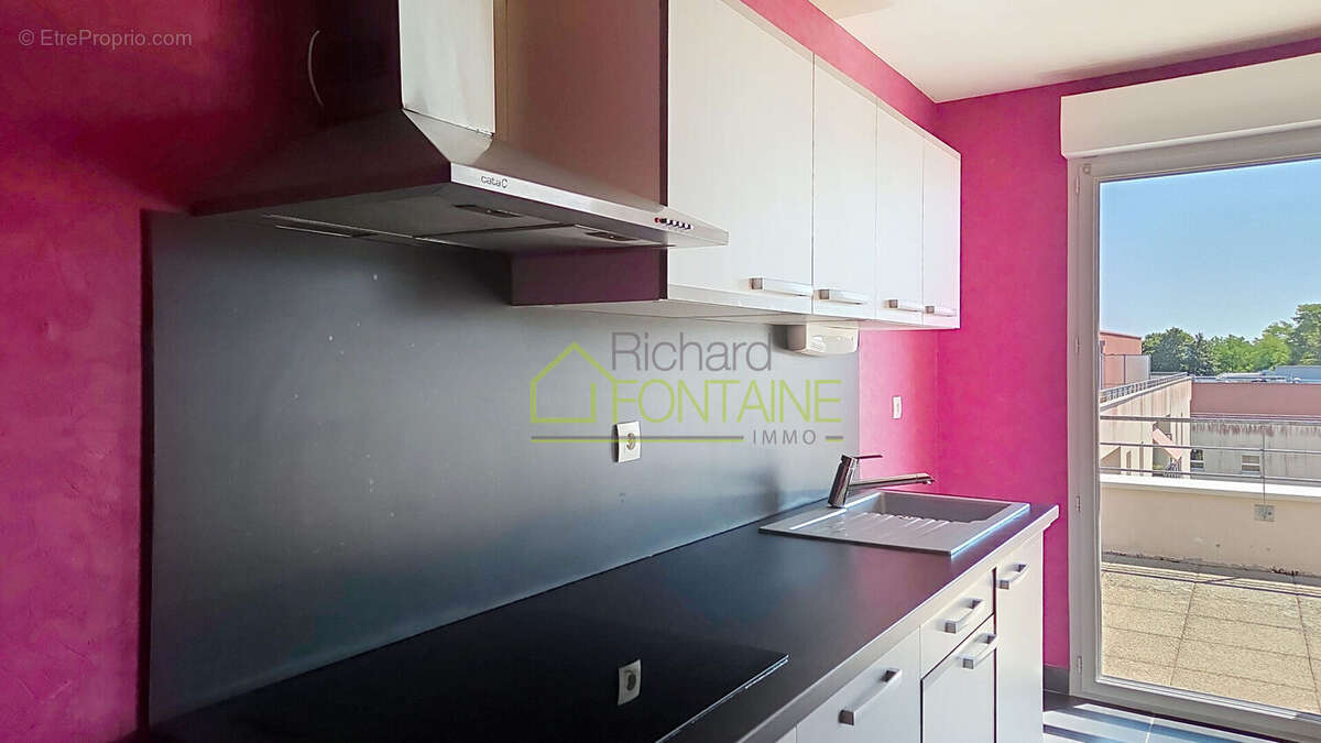 Appartement T2 en dernier étage avec grande terrasse et garage femé en sous-sol - photo 4