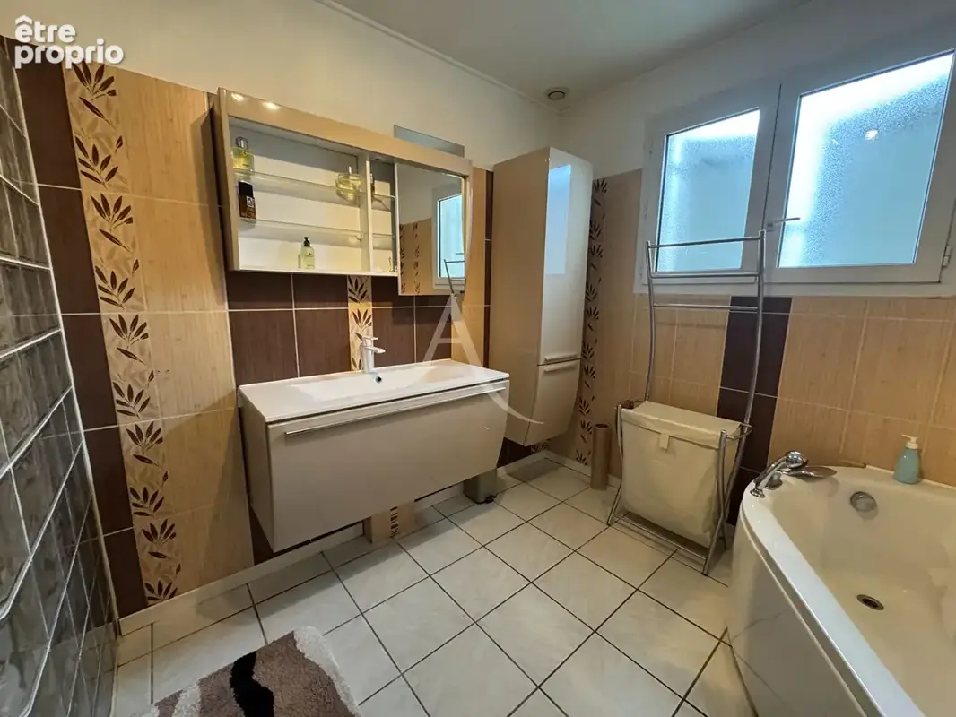 Maison de plain-pied 4 chambres avec jardin, garage et carports ? Bignoux - photo 6