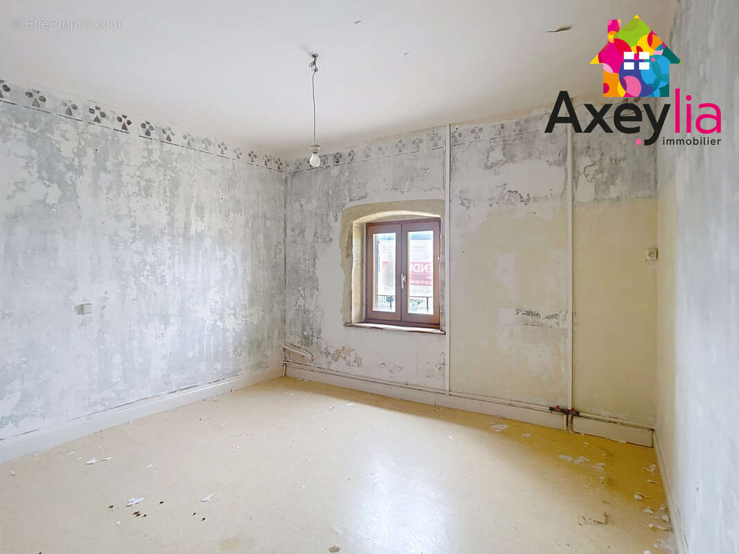 A vendre - cuinzier - logement t3 à rénover de 70m2 - photo 2