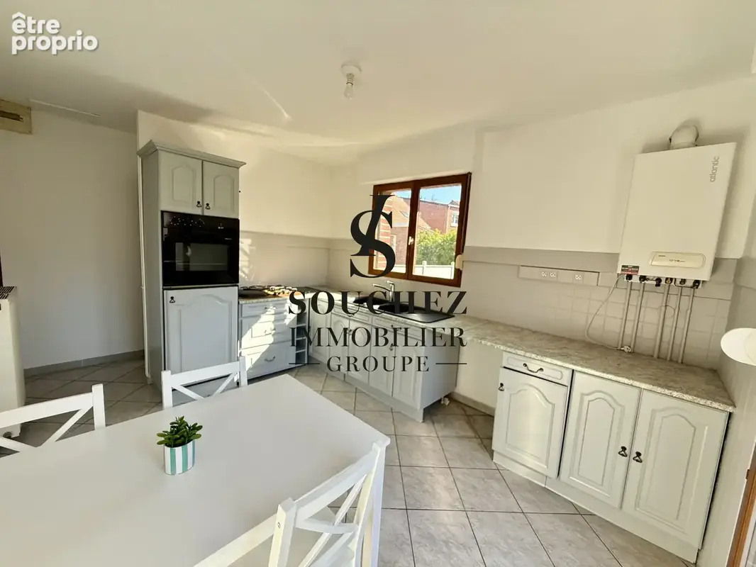 Maison 4 pièces 53 m² à vendre à Lens (62300) - photo 2