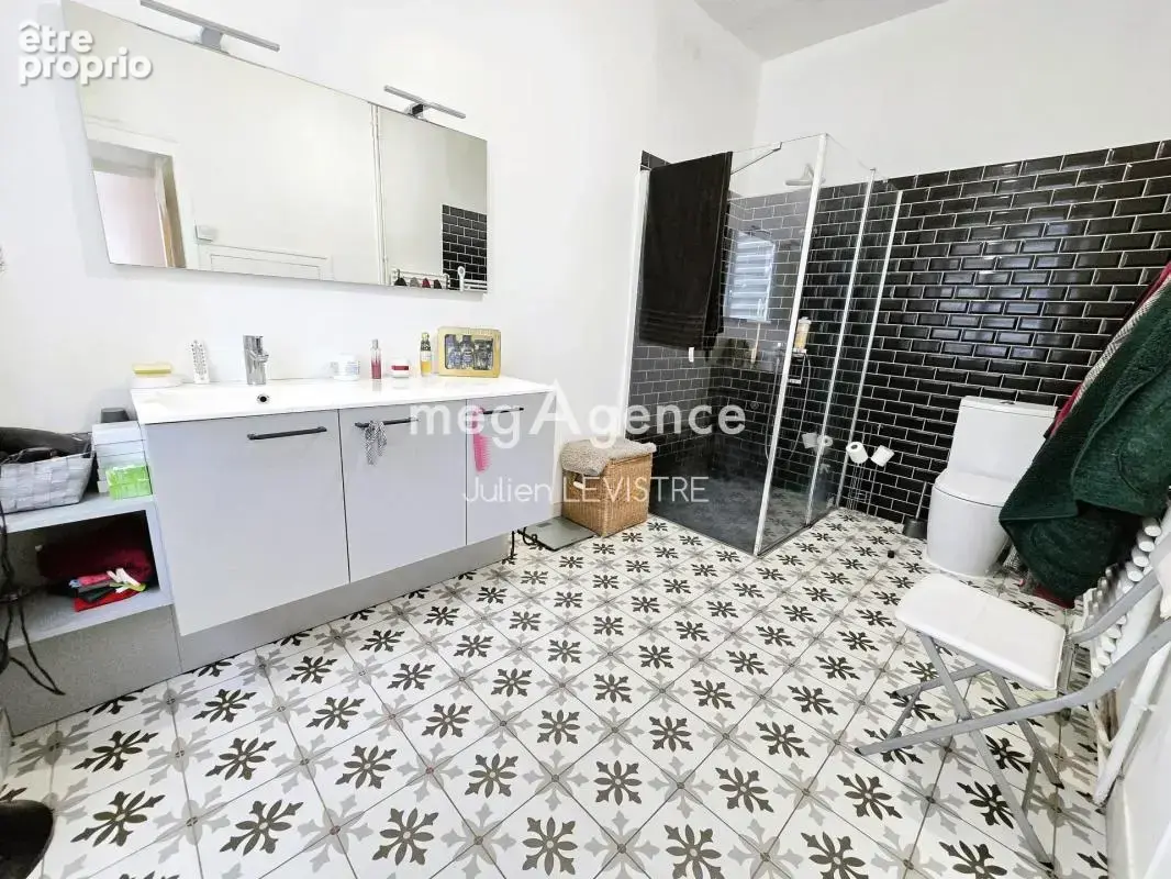 Maison de 7 pièces de 200m² - photo 5