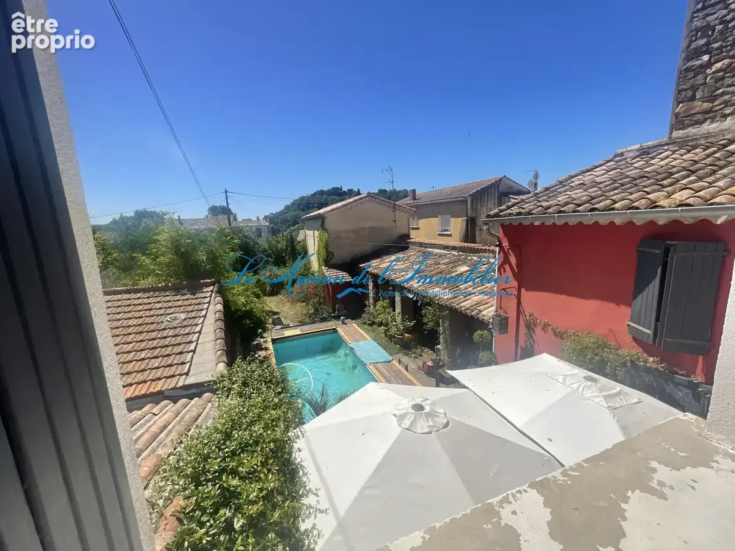 ST CHRISTOL LES ALES, maison en pierres F5 avec dépendances, chalet, piscine sur 2482 m2 de terrain avec puit - photo 9