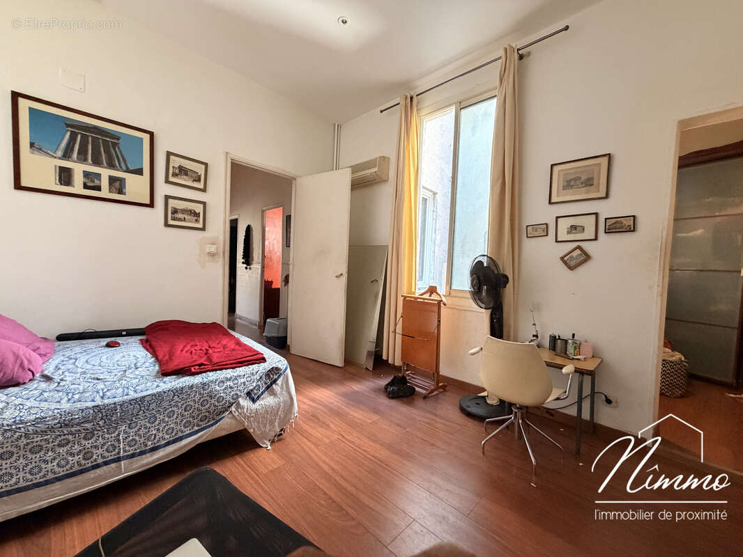Nimes maison carre appartement t3/4 82 m2 balcon cave - photo 8