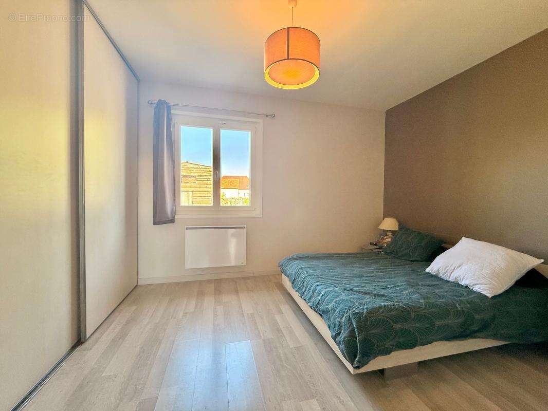 Maison de plain-pied - 3 chambres - terrain 1000 m² - garage - photo 12