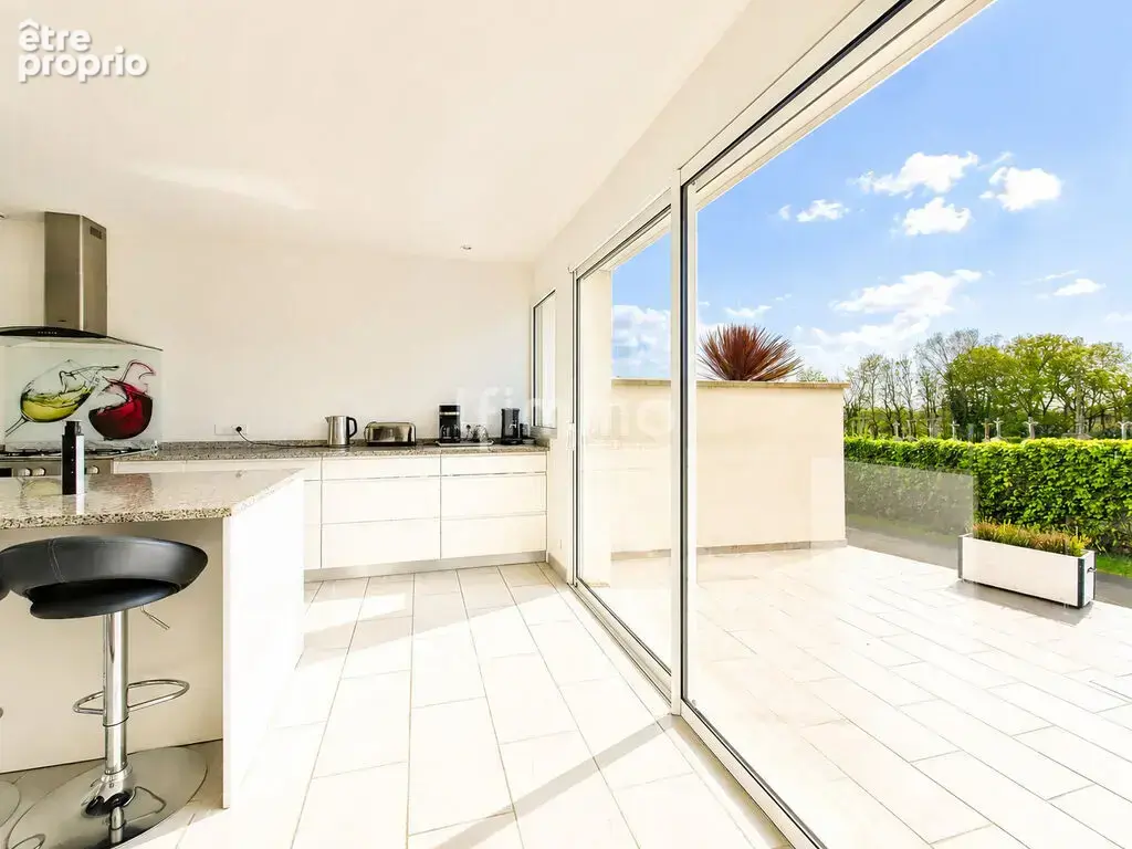 Maison, 6 pièces de 145 m² à Ploéven 29550 - photo 4