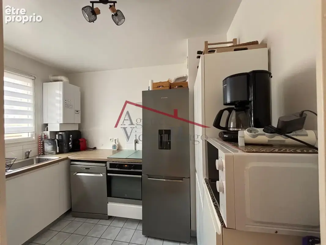 Appartement 3 pièces de 60m2 avec balcons et parking - SURESNES - photo 2