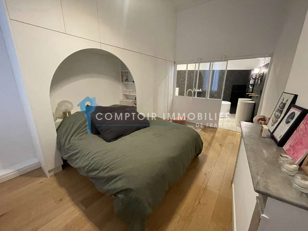 T4 Haussmanien en parfait état proche du centre ville - photo 6
