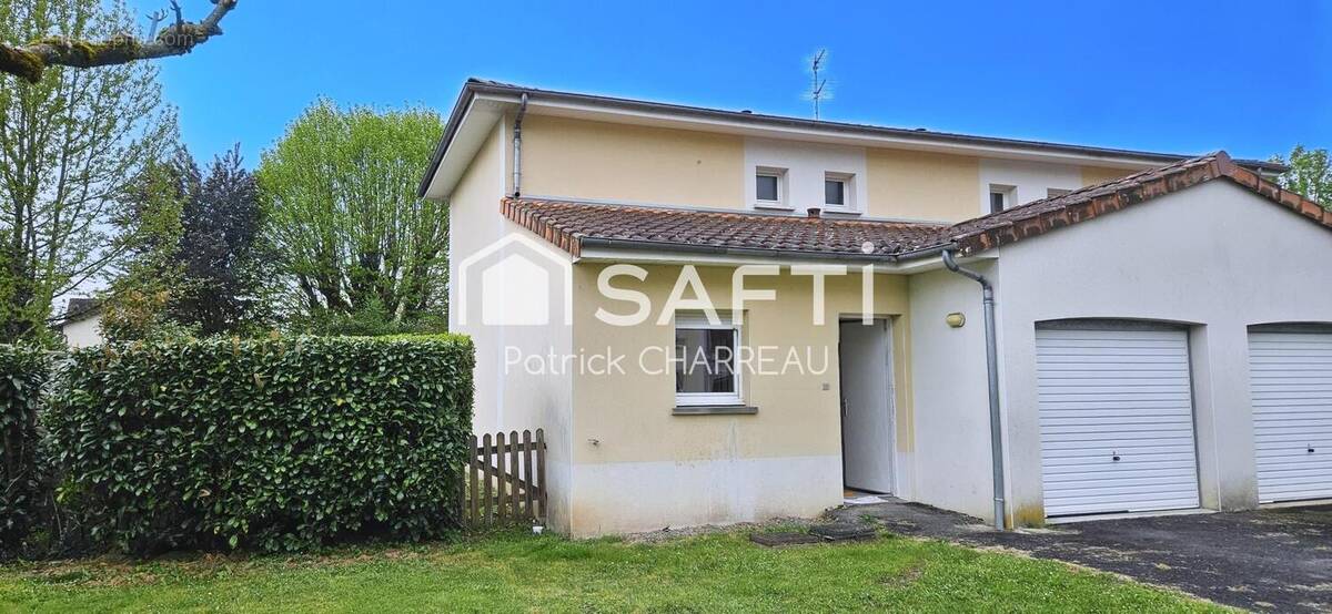 Photo 1 - Maison à TERRASSON-LAVILLEDIEU