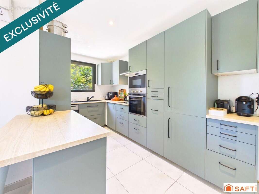 Maison 115 m² à Villeneuve-Tolosane  - photo 4