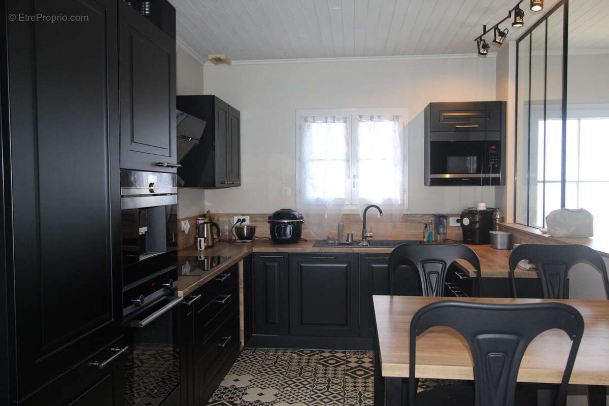 Maison avec deux garages - photo 3