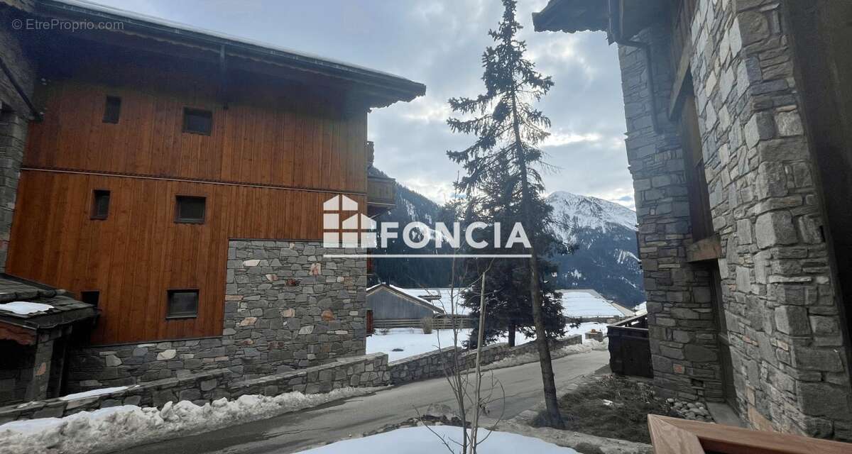 CHAMPAGNY-EN-VANOISE - LA VALLOISE - Spacieux T3 + Cabine avec grande terrasse et parking couvert ! - photo 20