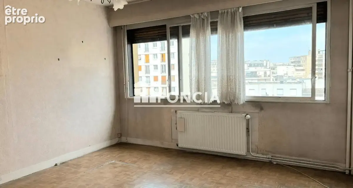 Appartement 2 pièces à moderniser en étage élevé - photo 4