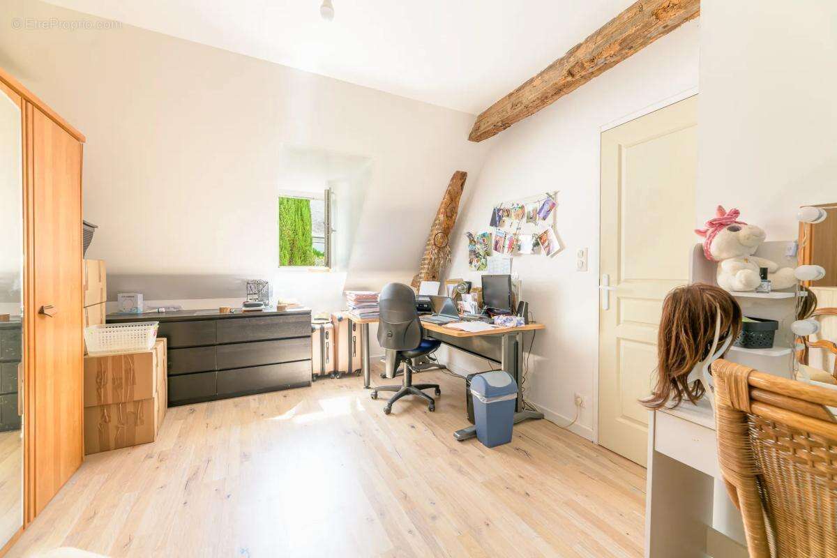 Maison de 5 pièces de 102 m² à Villechauve - photo 10