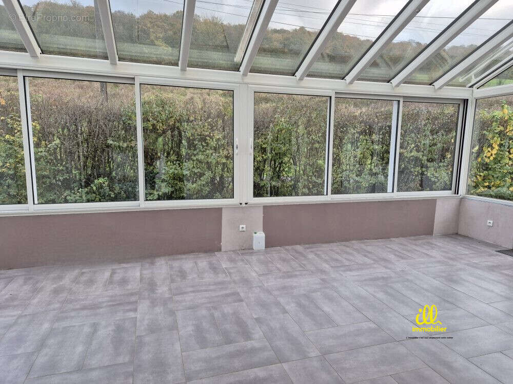 Véranda 30 m2 env avec store toit motorisé - Maison à ELAN